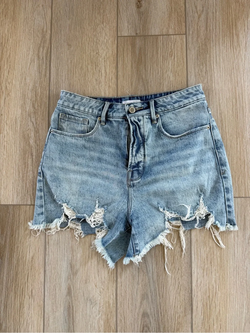 Good American Light Blue Distressed Denim Cutoff Shorts